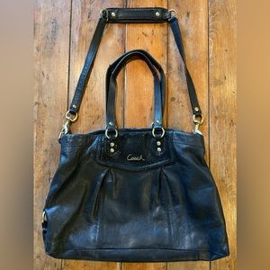 Black Leather Coach Handbag with Gold detail.